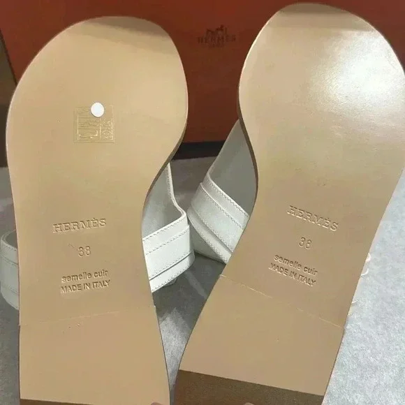 Hermes
Calfskin Womens Elixir
Sandals Sz 38 White

New/Full set 
Receipt in pics - Picture 6 of 6